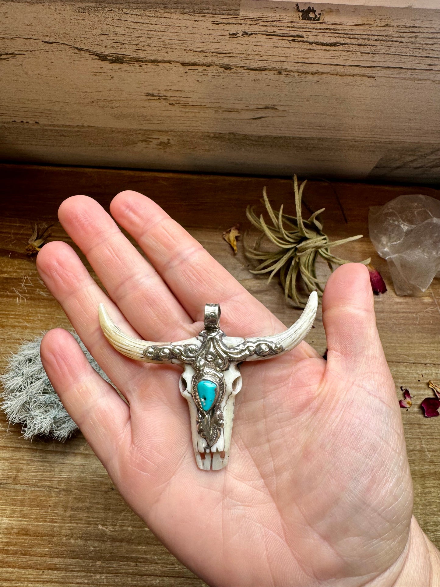 Antler longhorn with turquoise pendant